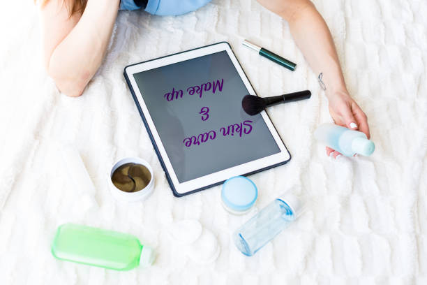 istock Woman reading an article about skincare 953433356