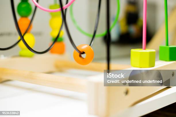 Wire Bead Maze Standing On A Table Kid Activitiescolorful Educational Toywooden Wire Maze Educational Game Toys Stock Photo - Download Image Now