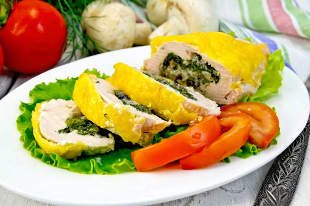 istock Roll chicken with mushrooms on salad in plate 953434810
