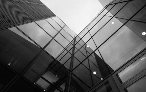istock The glass architecture in city against a sky 953434816