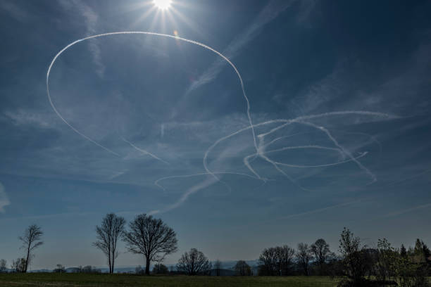 Sky with clouds after airplane and sun near Roprachtice village in north Bohemia