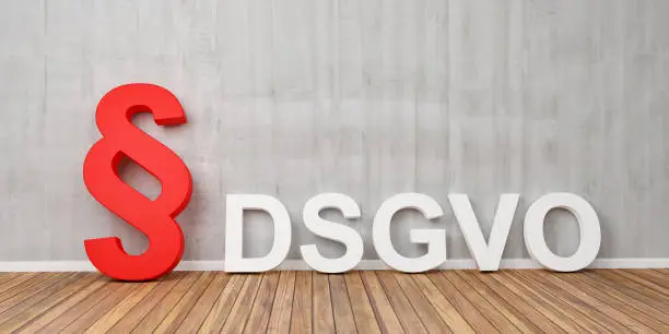 DSGVO Basic Data Protection Regulation Concept with red paragraph symbol on grey concrete wall - 3D Rendering.
