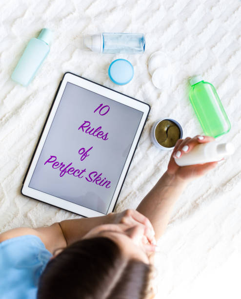 istock Woman reading an article about skincare 953437502