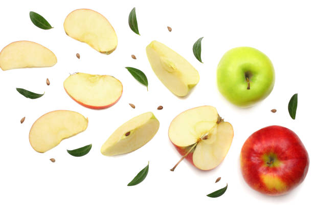 istock green and red apples with slices isolated on white background. top view 953438634