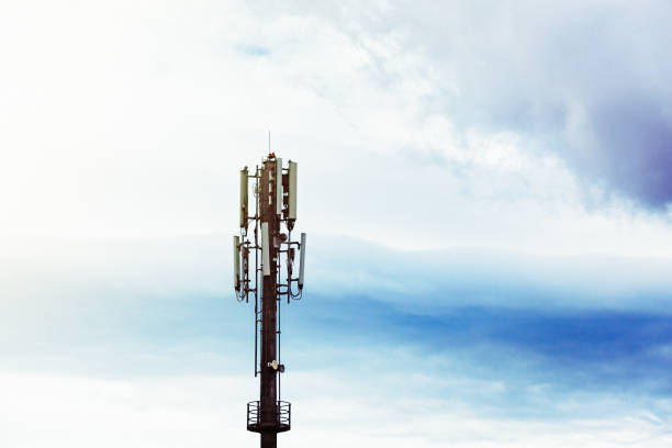 istock Cellphone base station mast against stormy sky 953440548