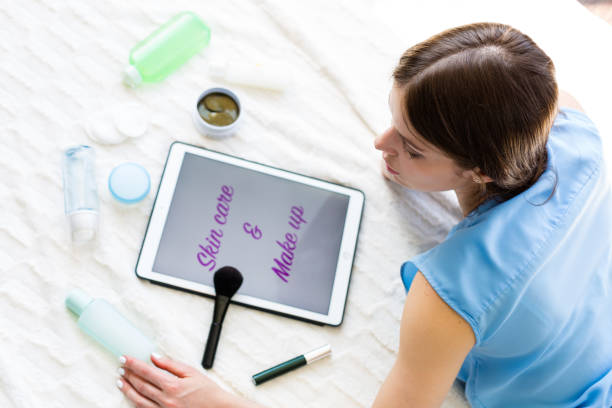 istock Woman reading an article about skincare 953442126