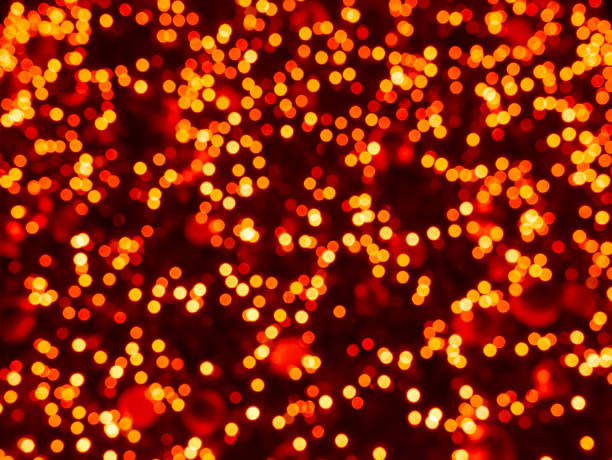 istock abstract, blurred background.and defocused in the dark night. and blurred christmas tree , yellow red color 953442466