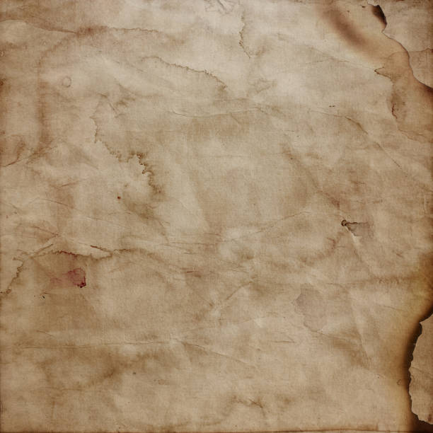 istock Grunge style burnt paper background 953446376