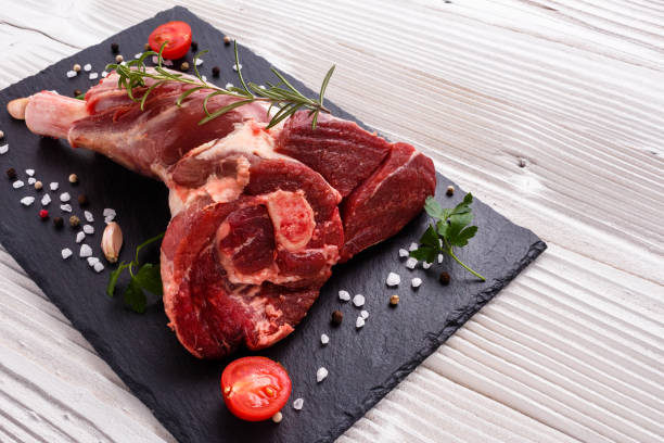 istock fresh lamb meat on a textured stone plate 953446536