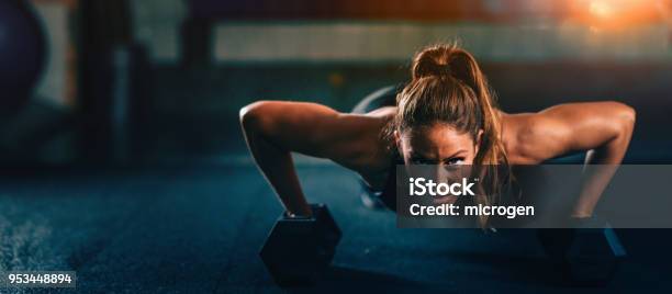 Cross Training Fitness Young Woman Exercising Stock Photo - Download Image Now - Exercising, Gym, Women