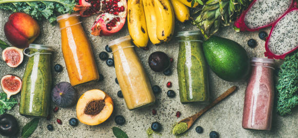 istock Colorful smoothies in bottles with fresh fruit, copy space 953451362