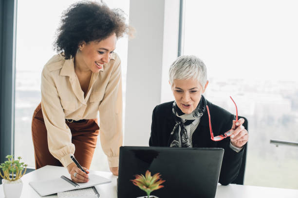 istock Happy coworkers at office 953458596