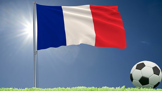 Flag of France fluttering and a football rolls on the lawn, 3d rendering