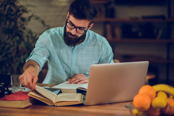 istock Young male student studying for the exams at home 953462584