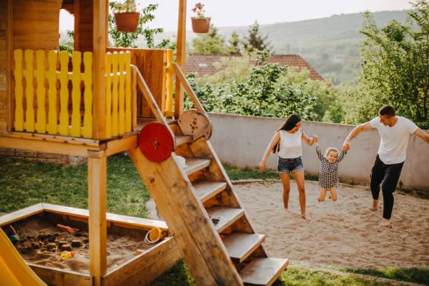 istock Happy family in sunset 953469500
