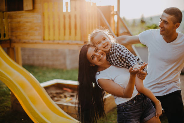 istock Happy family in sunset 953469734