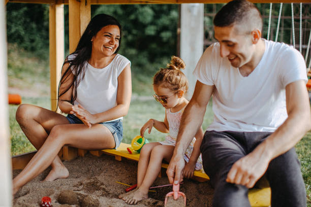 istock Happy family in sunset 953469738