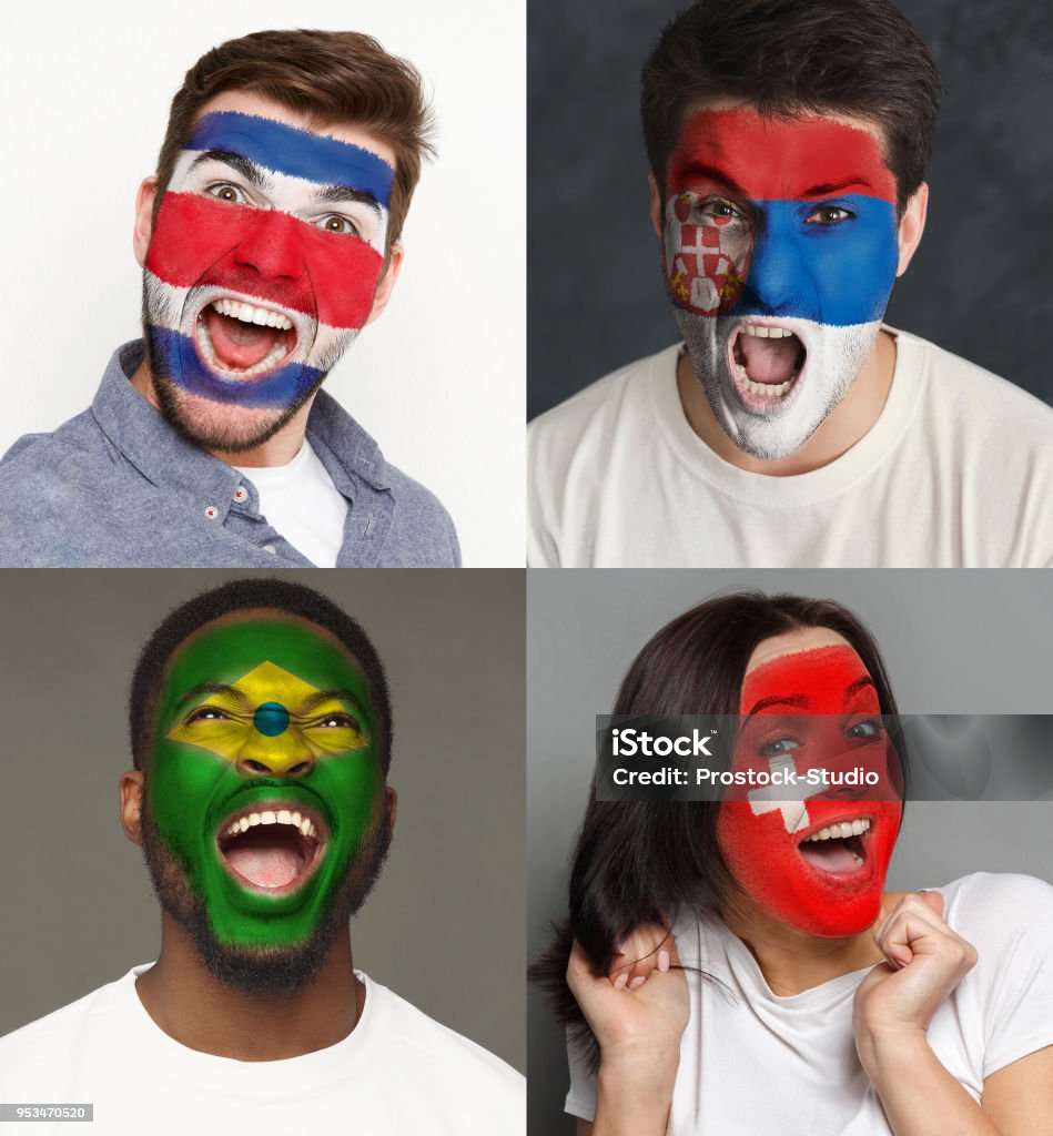 Amateurs de soccer émotionnelle avec drapeaux peints sur les visages - Photo de Football libre de droits