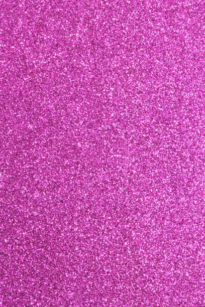 istock Magenta glitter background in reflective and shimmering material 953476152