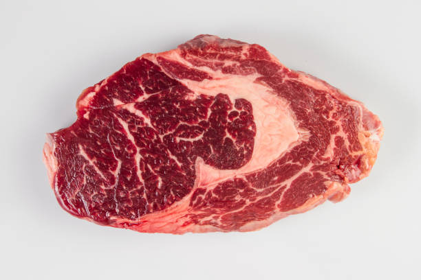 ripened seasoned beef rib eye or entrecote steak on white background isolated.top view. - scotch steak imagens e fotografias de stock