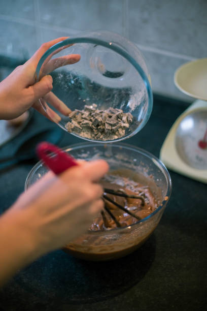 istock happy woman cooking on kitchen 953476316