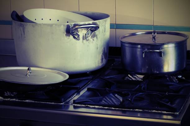 istock pots on the stove in the industrial kitchen with vintage effect 953477484