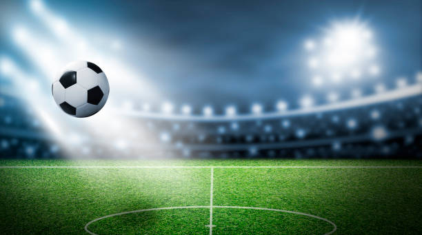 istock Soccer field and spotlight background in the stadium 953482382