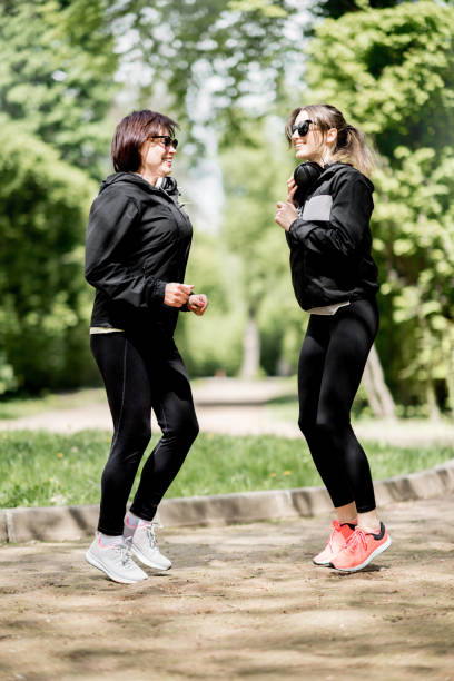 istock Two woman exercising in the park 953482864