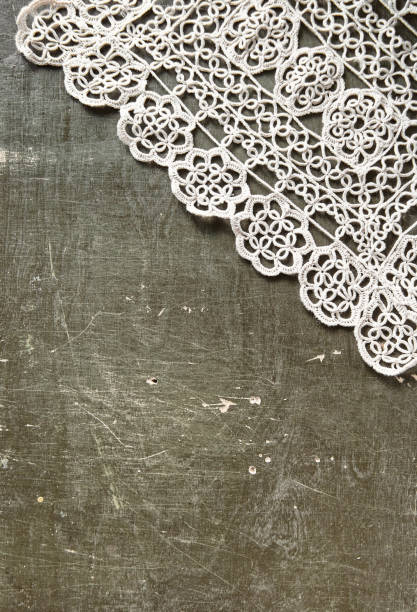 istock Vintage background with lace tablecloth on old wood 953505506