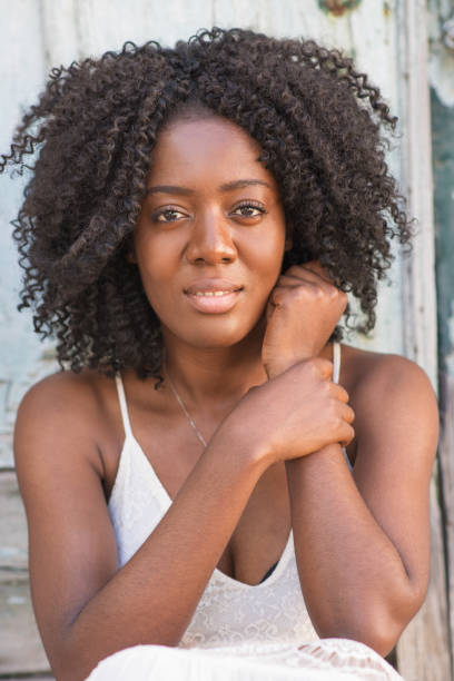 istock Content young beautiful black woman looking at camera 953511998