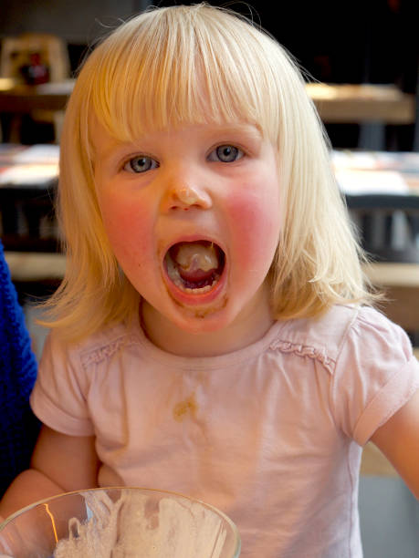 istock 2-3 Year Old Eating With Mouth Open 953514792