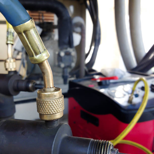 istock Vacuum pump evacuates and repair air conditioner. 953516788