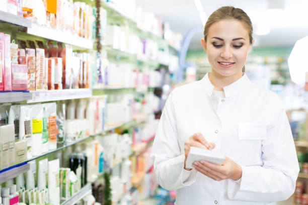 istock female pharmacist is inventorying medicines 953519024