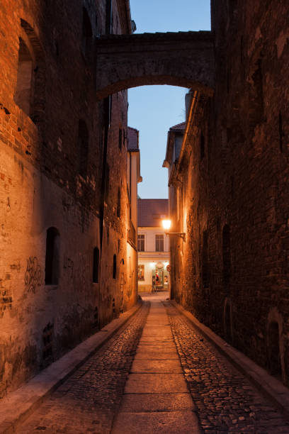 istock Ciasna Street by Night in Torun 953521318