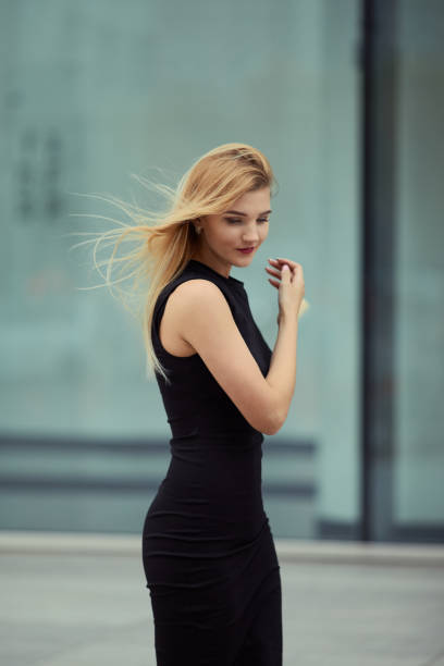istock Pretty girl walking on the street from work 953523868