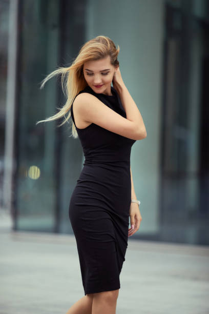 istock Pretty girl walking on the street from work 953524004
