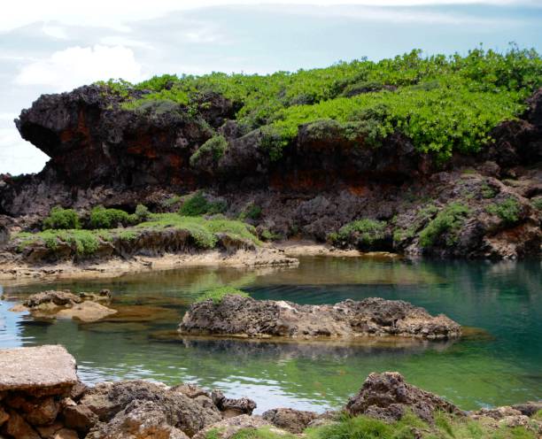 istock Inarajan Lagoon with rocky cliffs 953530166