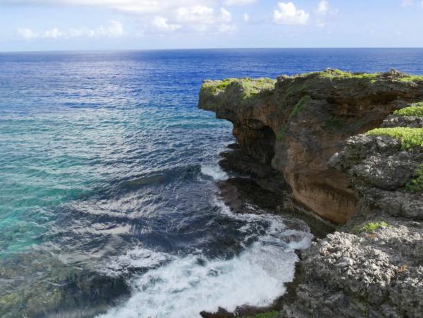 istock Breathtaking Cliffside above crashing waves in a tropical island 953530344