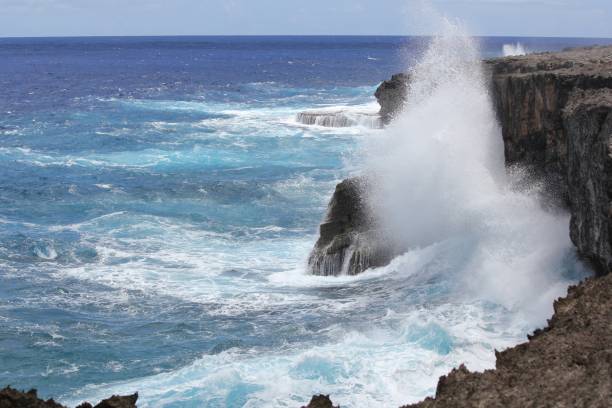 istock Forceful  giant waves smash against the steep cliffs 953534466