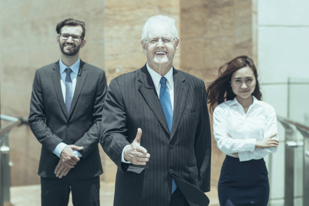 istock Business Leader Offering His Hand to Shake 953534740