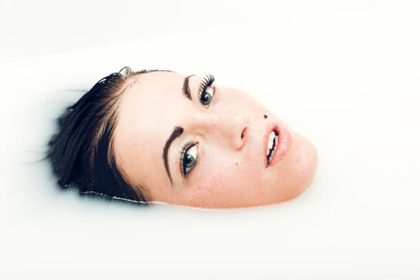 istock Beautiful Woman In White Water 953534846