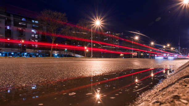 istock City traffic at night, speed light,  long exposure 953538472