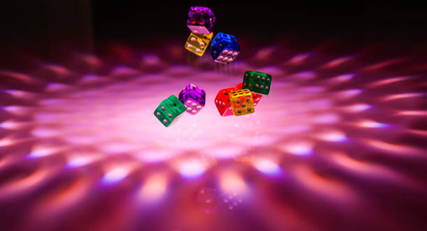 istock Let`s play a diced game. Dice in mid air 953547736