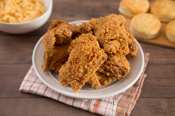 istock Classic Southern Fried Chicken on a Wooden Table 953548160