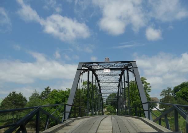 istock Old wooden bridge with steel 953558510