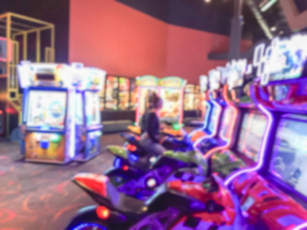 istock Blurred arcade game room at entertainment complex in America 953559866