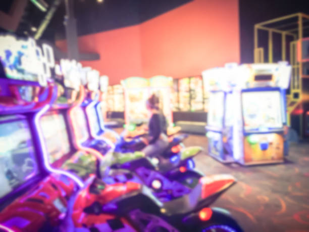 istock Blurred arcade game room at entertainment complex in America 953559892