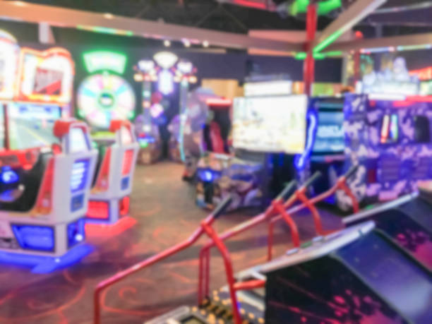istock Blurred arcade game room at entertainment complex in America 953566338