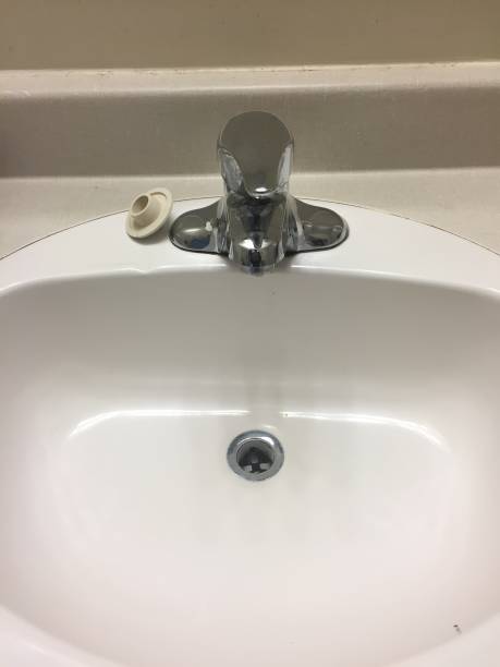 istock Bathroom sink faucet 953577350
