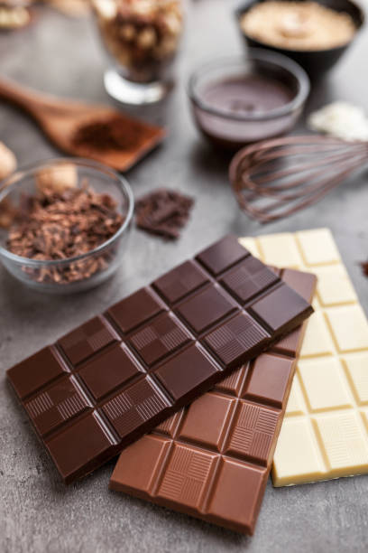 istock Delicious variety of chocole on rustic background 953578812